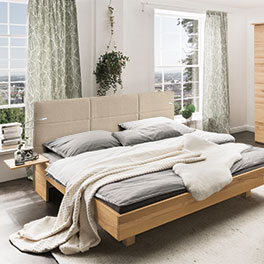 Mit Hilfe des Polsterkopfteil Savalis verwandeln Sie jede Liege in ein Bett mit Boxspring-Optik